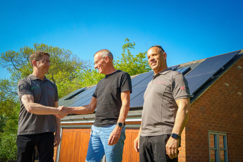 Elektra Smart Energy Team with a Happy Customer