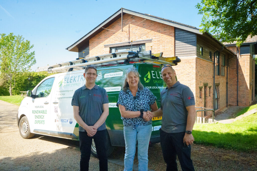 Elektra Smart Energy Team with a Happy Customer