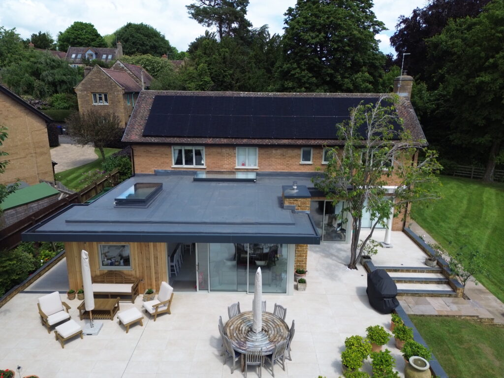 Bird's eye view of a roof solar panel installation in a family home in Northamptonshire