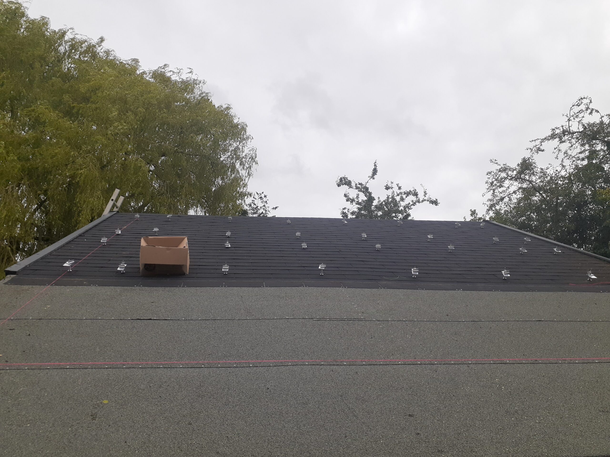 Preparatory work for the installation of roof solar panels on an outbuilding in Warwickshire